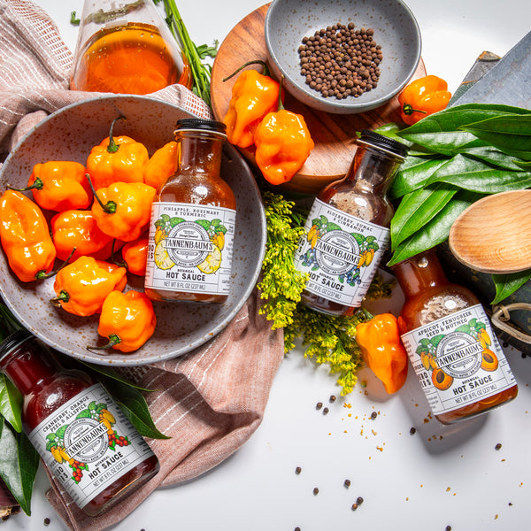 Spice Up Your Gifting Game with Tannenbaum’s Botanical Hot Sauces!